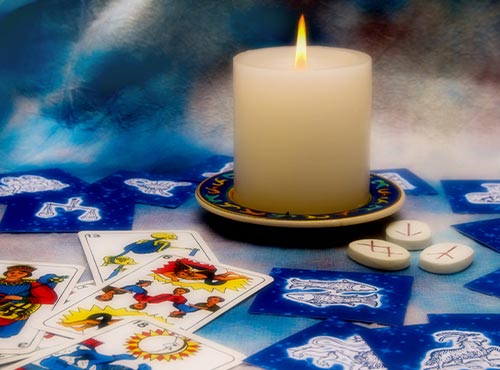 The reading of tarot cards and looking into the future are part of the mystical teachings of esotericism.